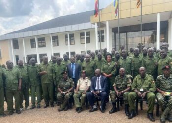 Minister Kyofatogabye,  Manifesto Director Mr. Bashaasha and other government officials in a group photo with district leaders from Greater Northern Uganda region
