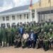 Minister Kyofatogabye,  Manifesto Director Mr. Bashaasha and other government officials in a group photo with district leaders from Greater Northern Uganda region