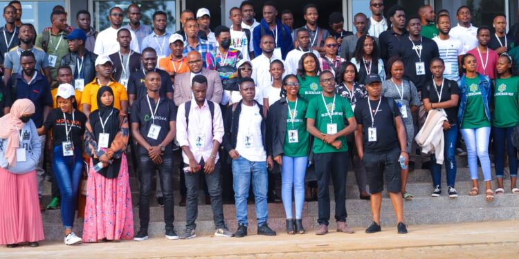 Participants and facilitators at the recently held Block Chain 360 event take a group photo Infront of the National ICT Innovation hub where the event was held