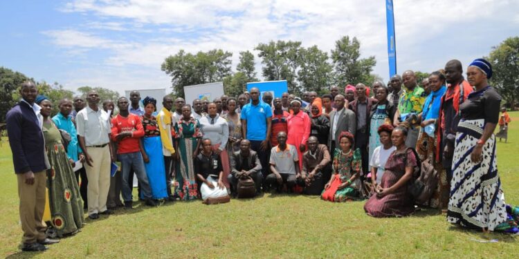 SACCO leaders and Parish Chiefs from Kayunga District pose for a group photo after the PDM training at Kayonza Primary School