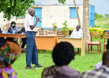 Gen Henry Isoke in a meeting with residents of Acholi