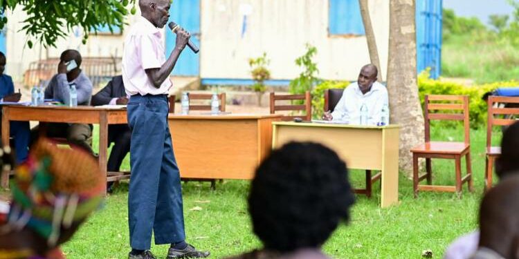 Gen Henry Isoke in a meeting with residents of Acholi