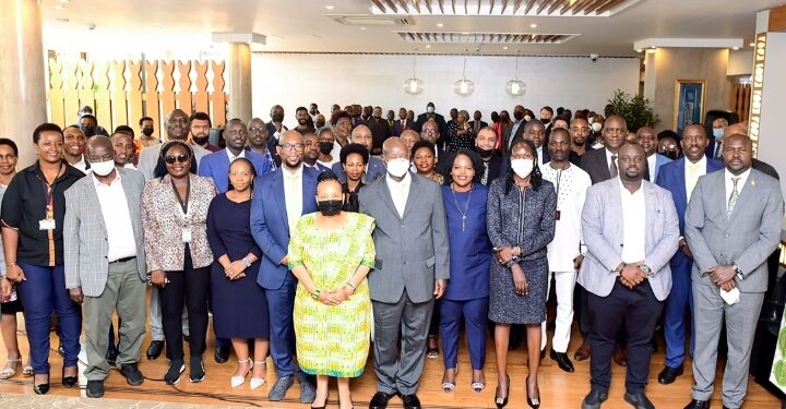 President Yoweri Museveni in a group photo with Ugandan and South African investors