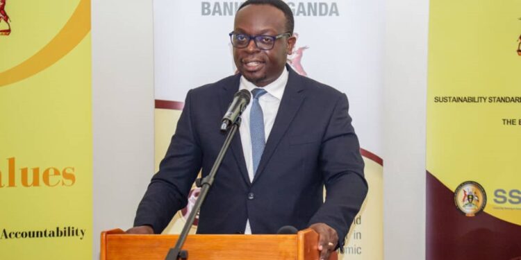 Post Bank Uganda CEO Julius Kakeeto addresses guests during the launch of the Sustainability Standards Certification Initiative by EOSD at Kampala Serena Hotel recently