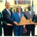 The Lord Mayor His Worship Haji Erias Lukwago (Centre) receives a gift of a memento of the
Sudanese Pyramid from H.E. Ahmed Osman Mohamed Ahmed the Governor of Khartoum State 
(Second Right), flanked left by H.E. Ambassador Ahmed Ibrahim Awadelseed. On the extreme is
Her Worship Doreen Nyanjura (Left) and H.E. Ambassador Dr. Rashid Ssemuddu (Right).