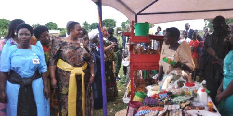 Minister Babalanda inspecting some of the products displayed by women during the event