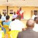 Hajjat Hadijjah Namyalo in red while delivering her message to coordinators at office Kyambogo