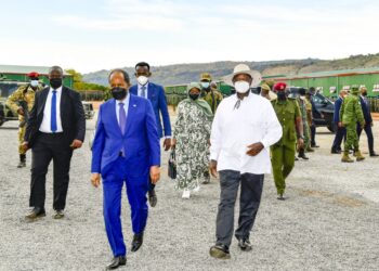 President Museveni and President Hassan Sheikh Mohamud of Somalia arrive in Butiaba to pass out Somali trainees on Sunday. PPU Photo