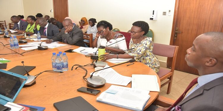 Hon. Aceng (2nd R) appearing before the Health Committee chaired by Hon. Ayume (R)