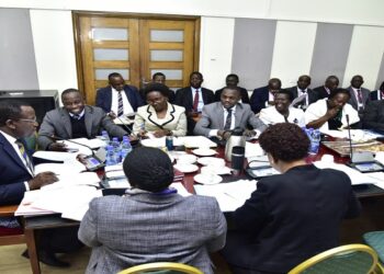 Hon. Peter Ogwang (2nd L) appearing before the committee chaired by Hon. Twesigye (L)