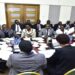 Hon. Peter Ogwang (2nd L) appearing before the committee chaired by Hon. Twesigye (L)