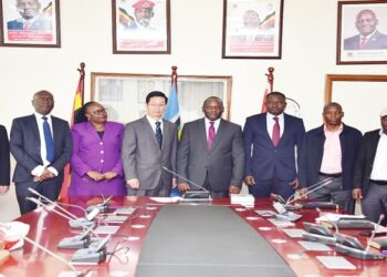 Hon. Mpuuga and Zhang Lizhong (C) with Opposition MPs and officiala from the Chinese Embassy after the meeting