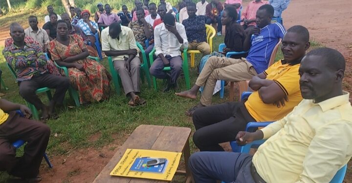 Trevor Solomon Baleke, the Namayingo Deputy Resident District Commissioner (light yellow shirt)