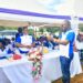 Minister Babalanda handing over President Museveni's and her contributions towards the construction of Iganga SS Science block