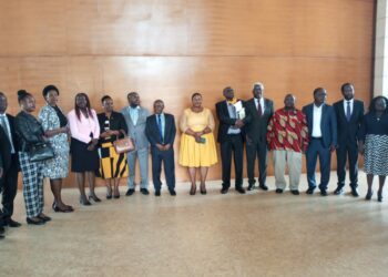 Hon. Milly Babalanda (Middle), Hajji Yunus Kakande and Mr. Kenneth Oluka in a group photo with the new UPPC board