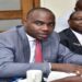 Minister Musasizi (L) with the Accountant General, Lawrence Semakula before the Committee on Finance