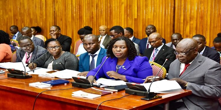 State Minister for Mineral Development, Lokeris (R) and the PS, Bateebe (2nd R) appearing before the Committee on Natural Resources