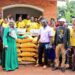 SPA Hajjat Hadijjah Namyalo handing over chicken feeds to the people of Luwero