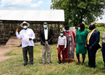 President Yoweri Kaguta Museveni with one of the model farmer in West Nile