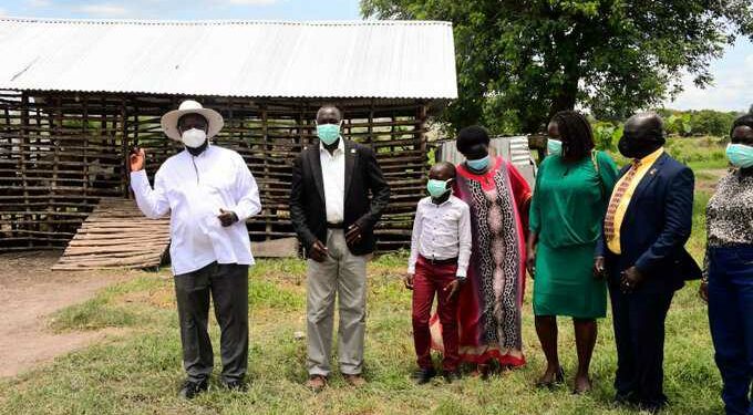 President Yoweri Kaguta Museveni with one of the model farmer in West Nile