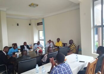 Umeme officials in an engagement meeting with locals