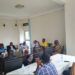 Umeme officials in an engagement meeting with locals