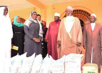 ONC Boss Hajjat Hadijjah Namyalo handing over food items to his Eminence the Mufti of Uganda Sheik Ramathan Mubaje yesterday