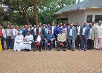 Hajji Yunus Kakande, Lt Col Emmy Katabazi,  RDC Secretariat Officials and RDCs/RCCs/DISOs in a group photo