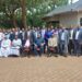 Hajji Yunus Kakande, Lt Col Emmy Katabazi,  RDC Secretariat Officials and RDCs/RCCs/DISOs in a group photo