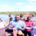 Hon. Mpuuga (c) speaking to journalists along the Villa-Maria, Kyamulibwa-Kabulasoke Road where another bridge was washed away