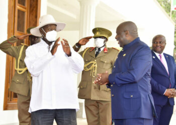 President Evariste Ndayishimiye of Burundi welcomes President Museveni at the summit venue in Bujumbura for the 18th ROM summit on Saturday. PPU Photo