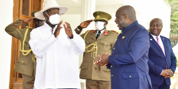 President Evariste Ndayishimiye of Burundi welcomes President Museveni at the summit venue in Bujumbura for the 18th ROM summit on Saturday. PPU Photo