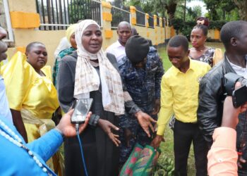 Hajjat Hadijjah Namyalo with the Bukomansimbi youth who paid a courtesy call to her office in Kyambogo