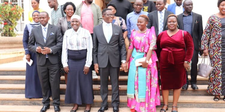 The ONC Team posing for the picture after a meeting with Katikkiro of Buganda