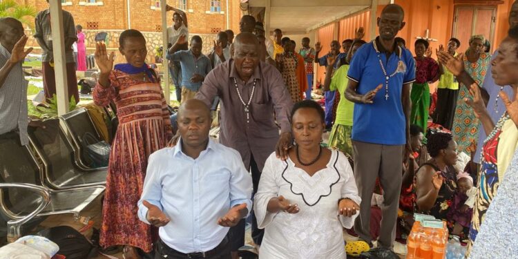 Zephline Muhangi ONC Coordinator Greater Mbarara with pilgrims from Mbarara