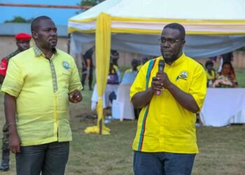 NRM SG Richard Todwong with Samuel Engola