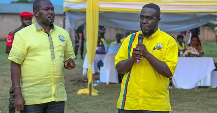 NRM SG Richard Todwong with Samuel Engola