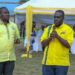 NRM SG Richard Todwong with Samuel Engola