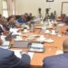 Lawyer Cephas Birungyi (R) appearing before the finance committee at Parliament House on Monday, 26 June 2023