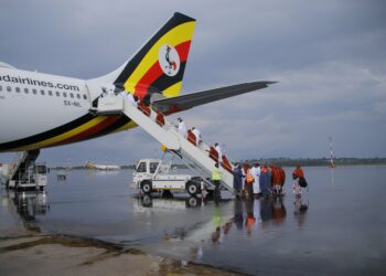 Pilgrims boarding Uganda Airlines