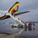 Pilgrims boarding Uganda Airlines