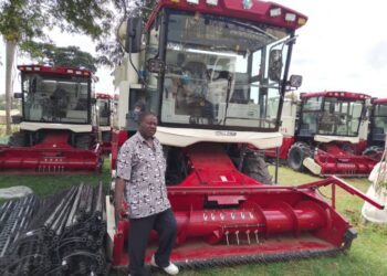 Mr Waya with some of the machinery donation from China at the district headquarters last week