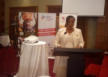 Minister of State for Youth and Children Affairs Sarah Mateke addressing participants at the World Day against Child Labour Conference at Sheraton Hotel, Kampala on Monday