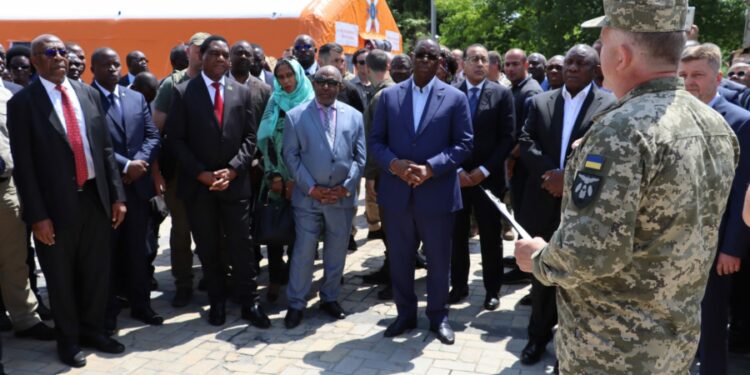 Presidents and Heads of Delegation being briefed by a Ukrainian Millitary officer at st. Michael's (Mykhailivska) Square during exhibition of destroyed Russian Hardware