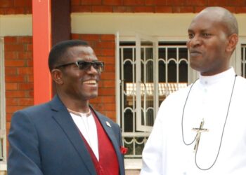 The katikkiro of Buganda Charles Peter Mayiga with Brother Augustine Mugabo, the head teacher St Henry's College Kitovu