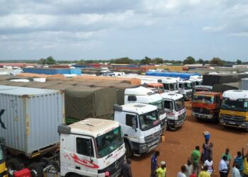 Trailers carrying goods from Uganda