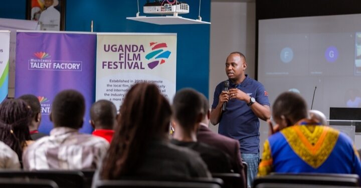 Rinaldi Jamugisa, PR and Communications Manager MultiChoice Uganda speaking to the participants during the training on the business if film at UCC House in Kampala recently.
