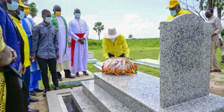 President Yoweri Museveni Laying of wreaths on the grave Rtd. Col. Charles Ongola Macodwogo at the late's home in Awangi Iceme subcounty in Oyam District on 4th July 2023. Photo by PPU/Tony Rujuta.