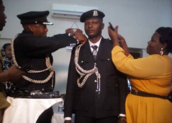 A Police Officer being decorated at Fairway Hotel in Kampala on Thursday