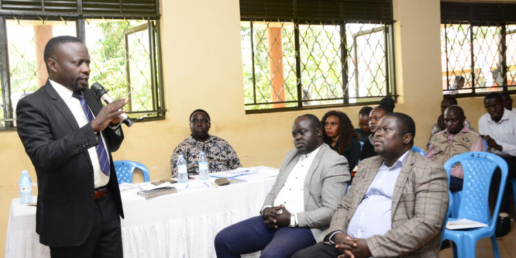 Dr Hillary Emma Musoke addressing leaders during the strategic campaign on alternative income generating activities for the fishing communities in Uganda stakeholders workshop at Buikwe District headquarters on 5/July/2023